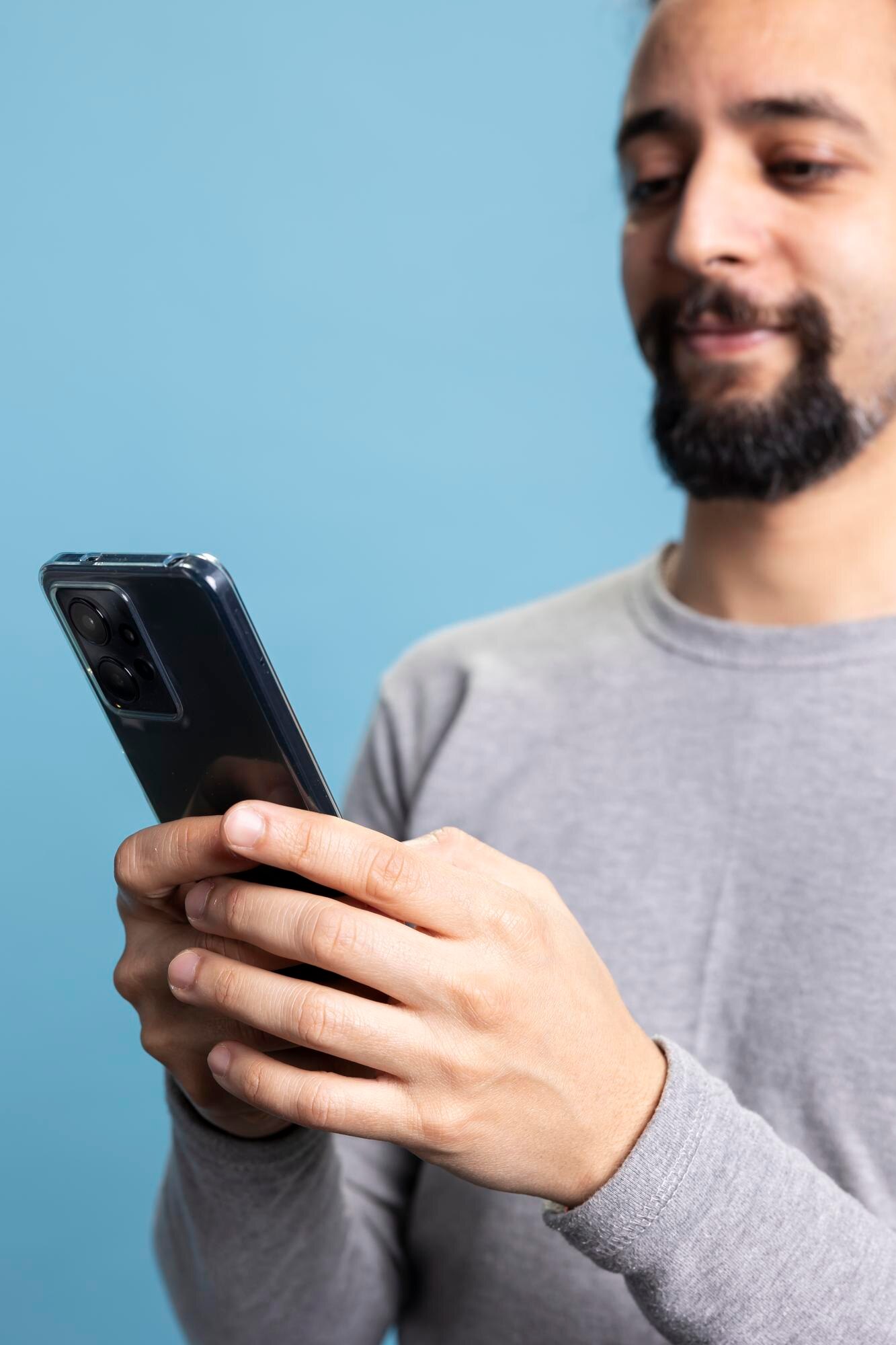 confident man works smartphone while engaging digital communication 482257 121833